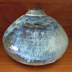 The Wet - inspired by the opaque pooled water in the streams after The Wet season, in the dry country. Buff Raku, rutile glaze, 1280 oC 